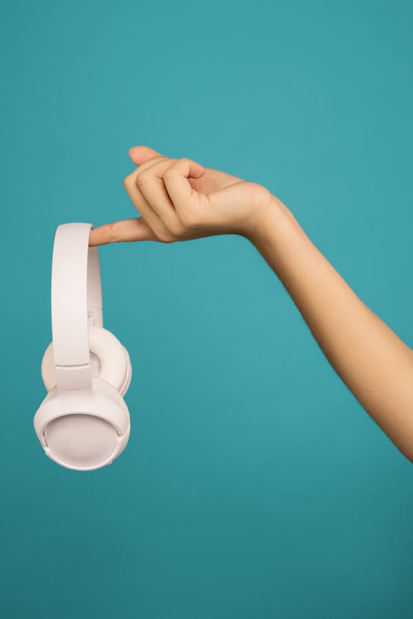 Audifort supplement bottle with brain and ear illustration showing dual-action hearing and brain health support